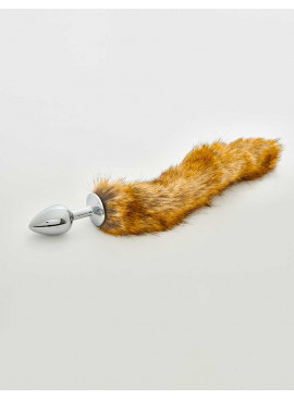Metal butt plug with faux fur tail