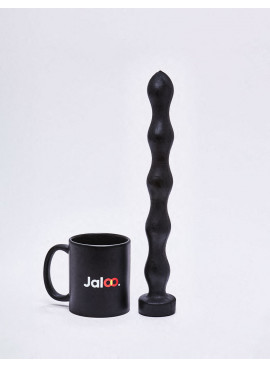 XL Dildo from All Black in 32cm compared to a mug